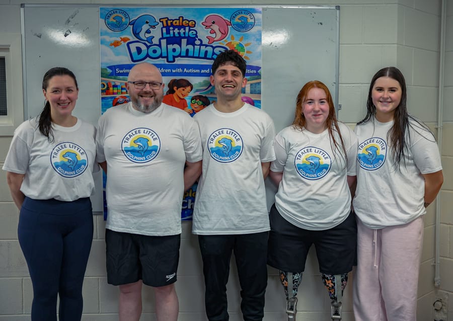 Five Tralee Little Dolphins coaches in club T-shirts standing together at the Open Day